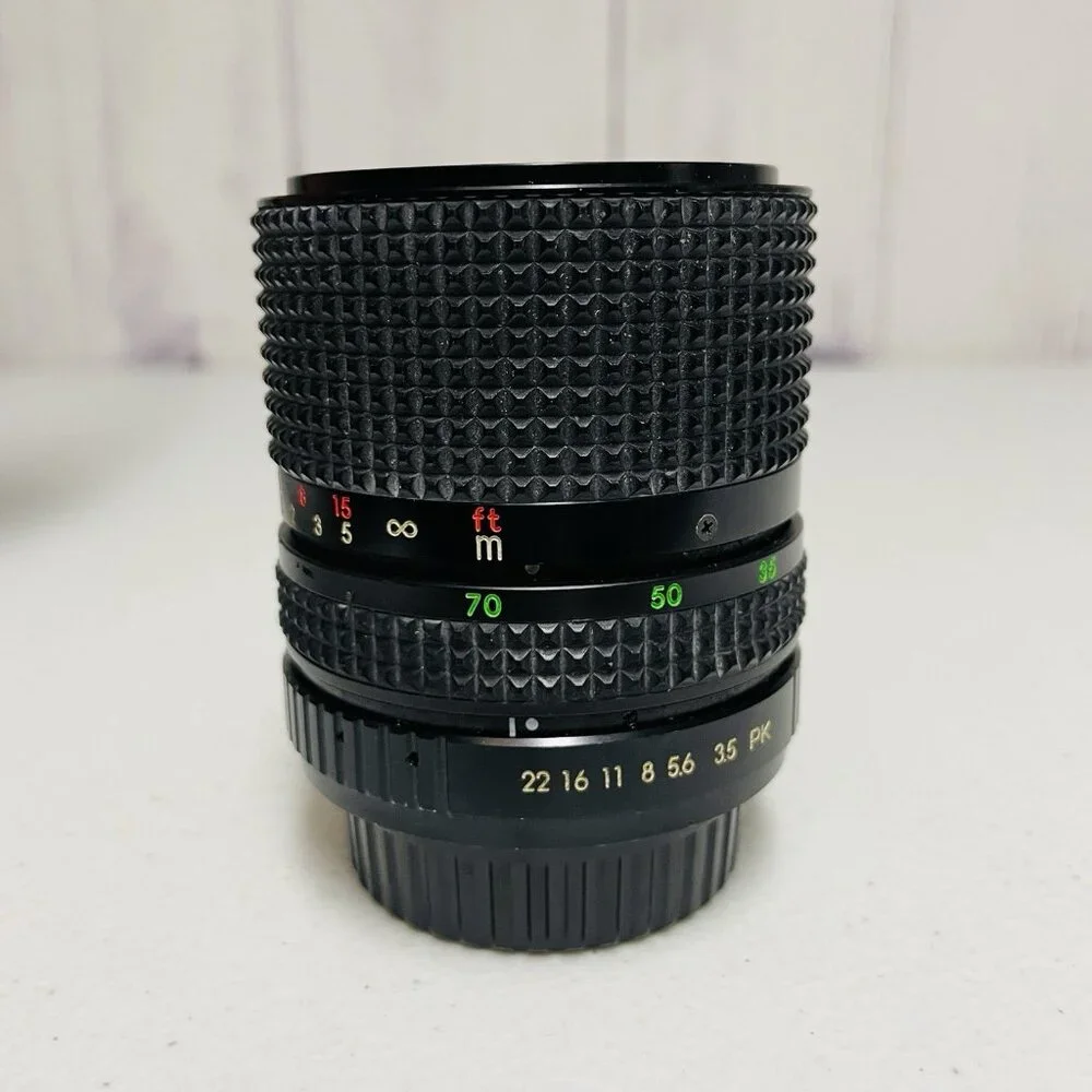 RKN MC AUTO ZOOM 1:3.5-4.5 f=35-70MM CAMERA LENS